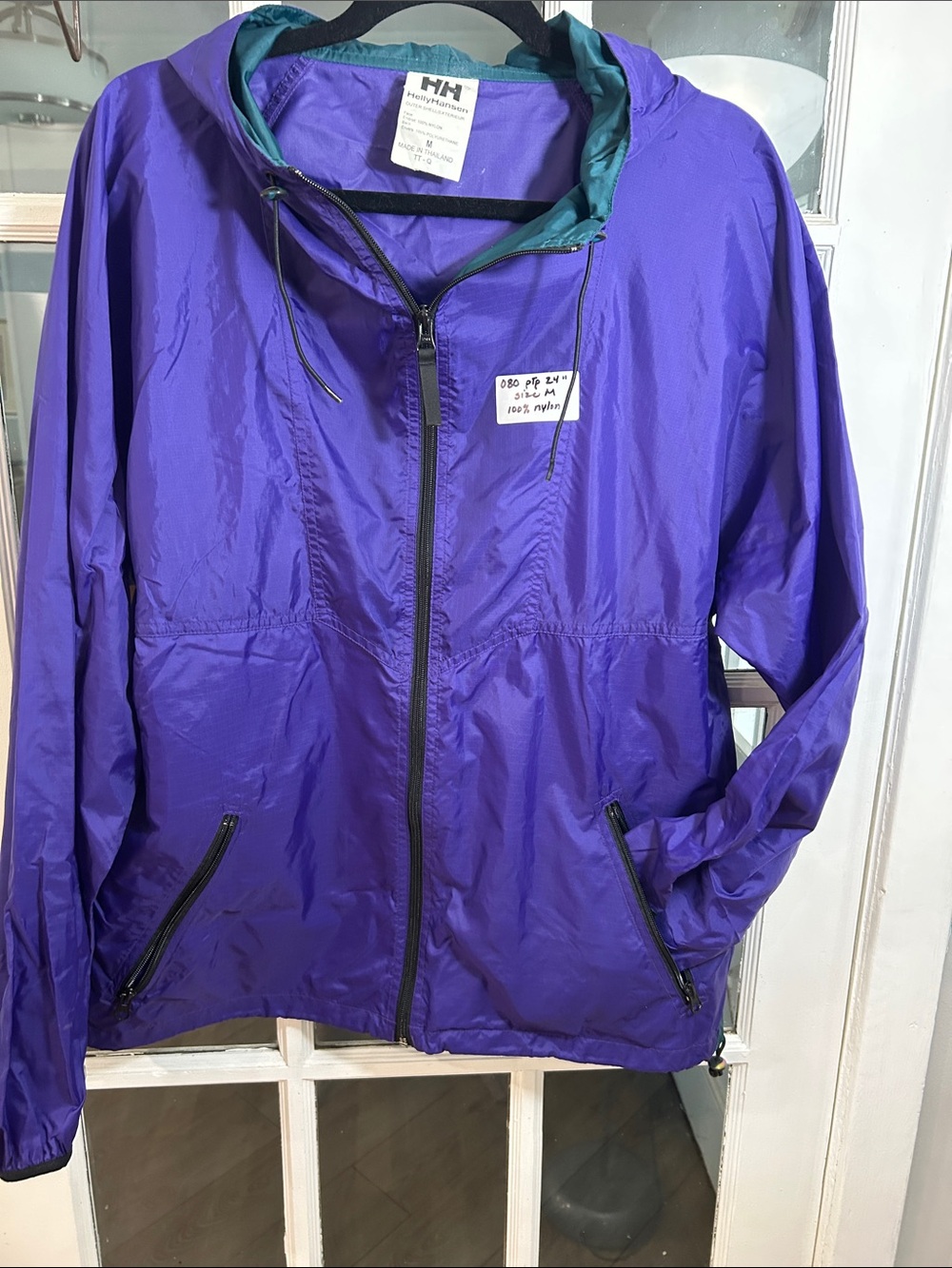 O80. Helly Hansen Purple Kids Hooded Rain Jacket with Teal Lining